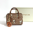 کیف کوچ مینی صندوقی اسنوپی قهوه ای مدل COACH X Peanuts 